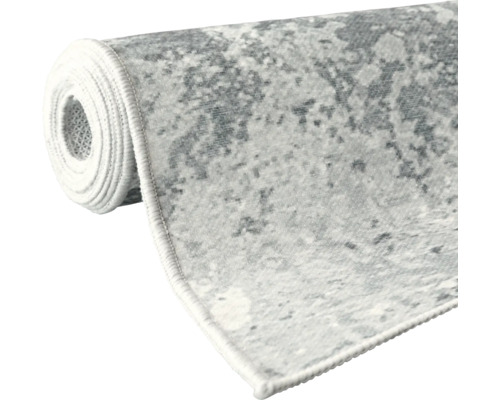 Gerollter Teppich mit Muster