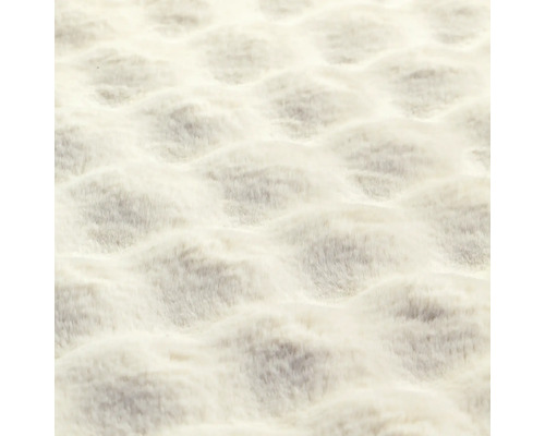 Nahaufnahme eines Teppichs mit wellenförmiger Struktur