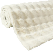 Gerollte Kuscheldecke mit Reliefstruktur