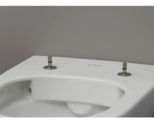 Detailansicht einer Toilette mit WC-Sitz-Befestigung