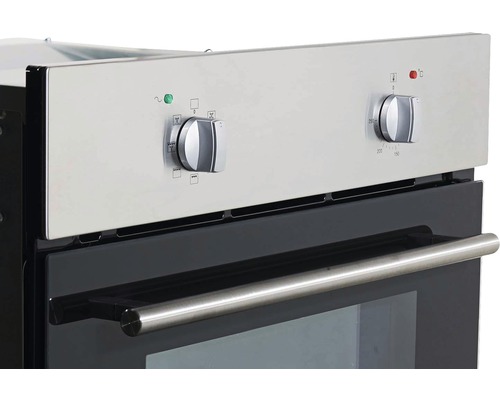 Gros plan d''un four avec régulateur de température et sélecteur de fonctions