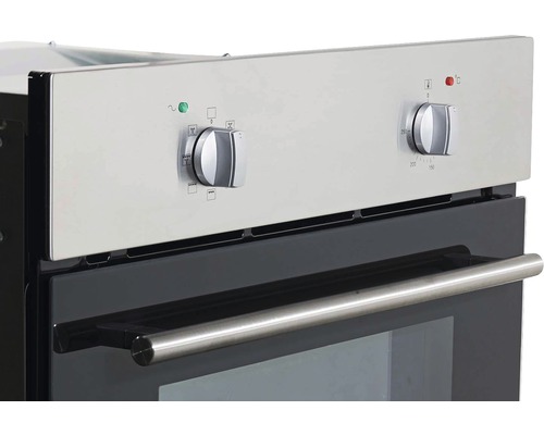 Vue détaillée d''un four encastrable avec des boutons rotatifs pour la sélection de la température et des fonctions