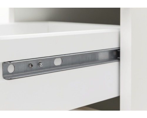 Gros plan d''un tiroir avec un rail métallique