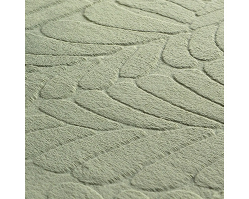 Gros plan d''un tapis avec motif de feuilles