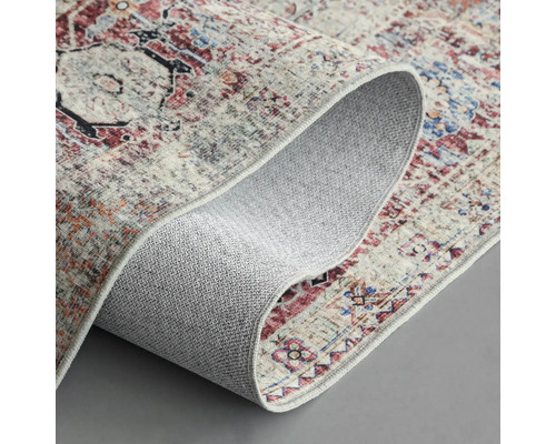 Tapis à motifs avec bord ondulé