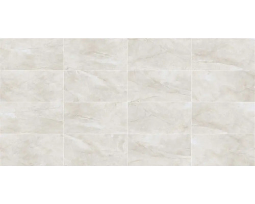 Rechteckige, helle Wandfliesen mit Marmorstruktur.