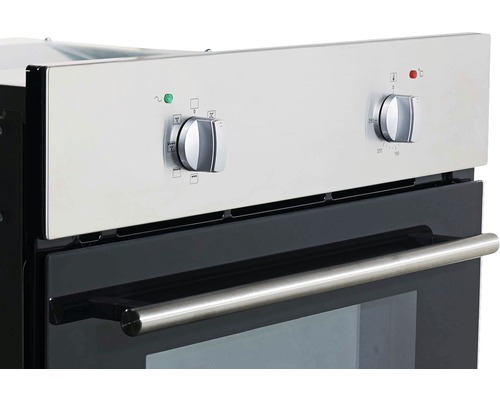 Gros plan d''un four avec des boutons rotatifs