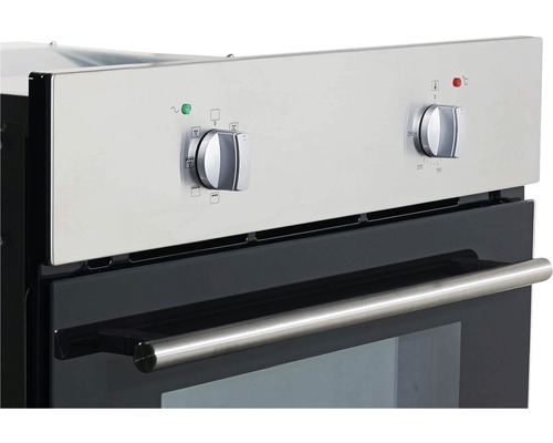 Gros plan d''un four avec des boutons rotatifs pour régler la température et sélectionner les fonctions.