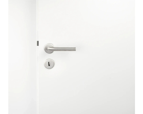 Weisse Innentür mit Edelstahl-Drückergarnitur und Schlüsselloch