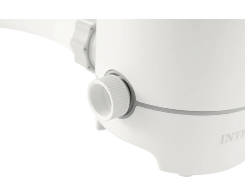 Vue détaillée d''un appareil de cuisine blanc avec bouton rotatif