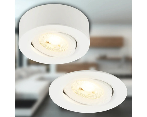 Zwei weisse Deckeneinbauleuchten mit verstellbaren Strahlern