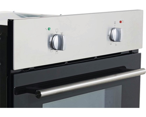 Vue détaillée d''un four avec régulateur de température et sélecteur de fonctions