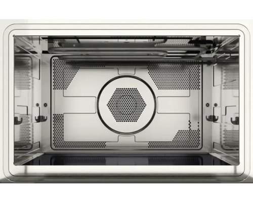Intérieur d''un four avec éléments chauffants et tôle perforée