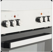 Vue détaillée d''une cuisinière avec des boutons rotatifs