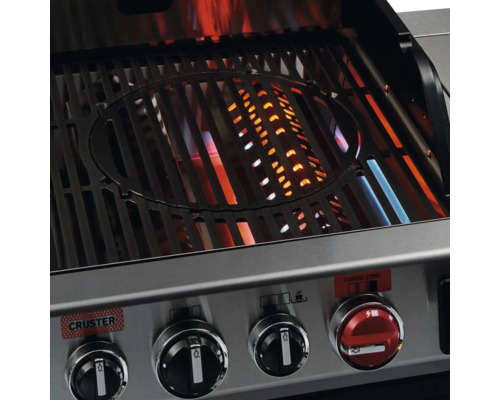 Gros plan d''un gril à gaz avec grille et boutons de commande.