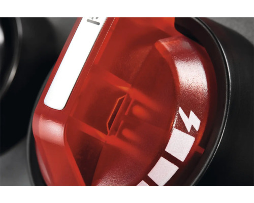 Gros plan d''un bouton rotatif rouge pour le réglage de la température