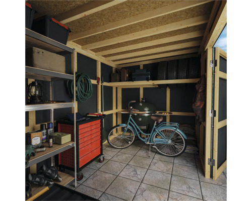 Abri de jardin bien rangé avec étagères, servante d''atelier, vélo et barbecue