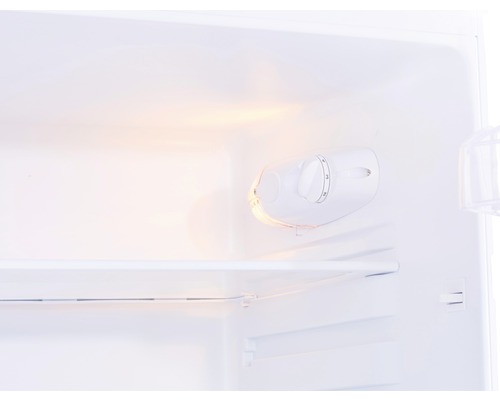 Intérieur d''un réfrigérateur avec régulateur de température et étagère