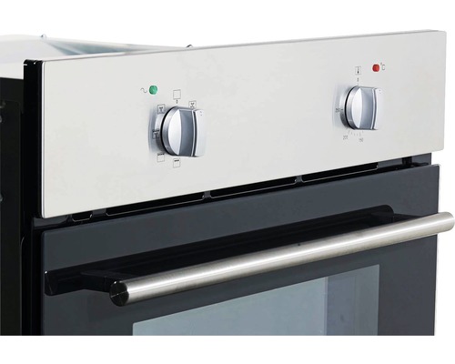 Gros plan d''un four encastrable avec des boutons rotatifs pour le contrôle des fonctions et de la température