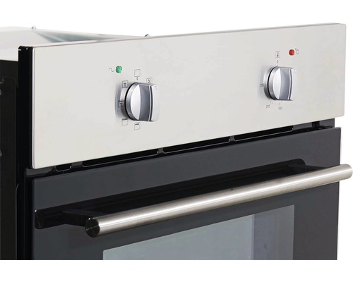 Gros plan d''un four avec thermostat et sélecteur de fonctions