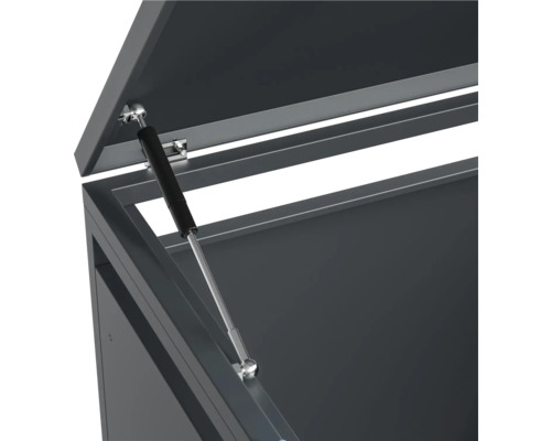 Vue détaillée d''un coffre de rangement avec ressort à gaz pour le support du couvercle