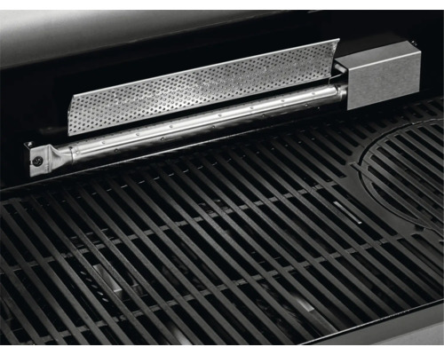 Vue de l''intérieur d''un gril à gaz avec grille et brûleur