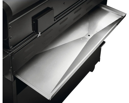 Barbecue avec bac de récupération des graisses déployé.