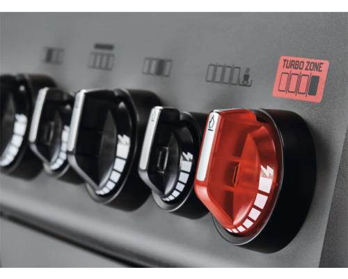 Gros plan d''un barbecue à gaz avec des boutons rotatifs pour régler la chaleur