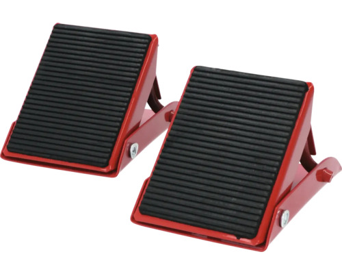 Zwei rote Unterlegkeile mit geriffelter Oberfläche zur Fahrzeugsicherung.