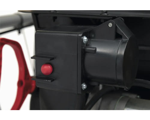 Detailansicht einer Schneefräse mit rotem Knopf