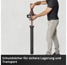 Mann setzt eine Heckenschere in eine Köcherhülle für Lagerung und Transport