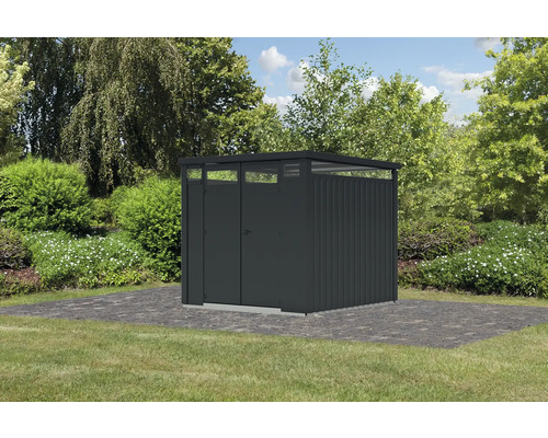 Abri de jardin métallique avec double porte dans le jardin