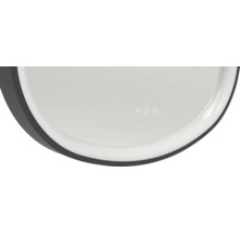 Vue détaillée d''un miroir rond avec fonction tactile pour l''utilisation