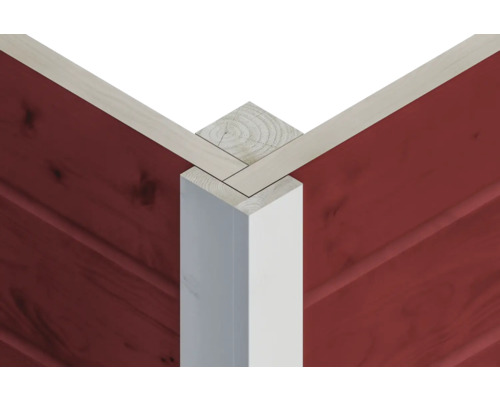 Vue détaillée d''un assemblage d''angle en bois avec un revêtement mural rouge