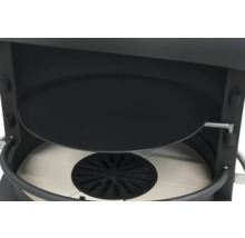 Vue détaillée d''un four à pizza avec pierre à pizza et grille de four.