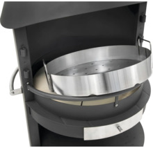 Gros plan d''un barbecue à charbon de bois avec grille en métal