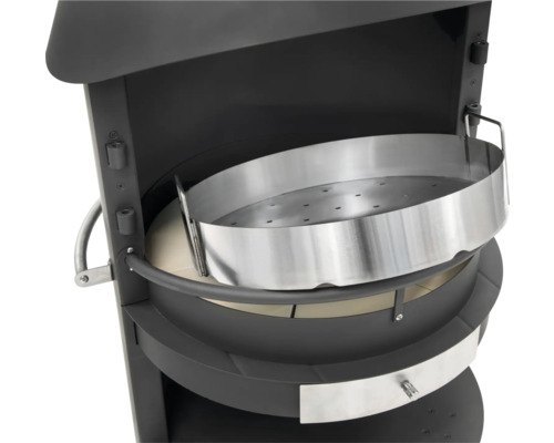 Gros plan d''un barbecue à charbon de bois avec grille en métal