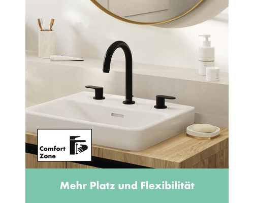 Waschbecken mit schwarzer Armatur und Comfort Zone Symbol für mehr Platz und Flexibilität
