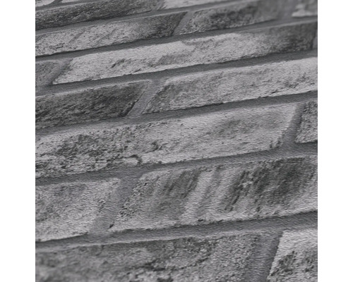 Gros plan d''un papier peint à motif de briques