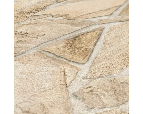 Gros plan d''un papier peint en pierre avec des pierres de formes irrégulières.