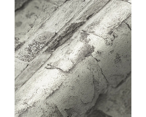 Gros plan d''un rouleau de papier peint aspect pierre.