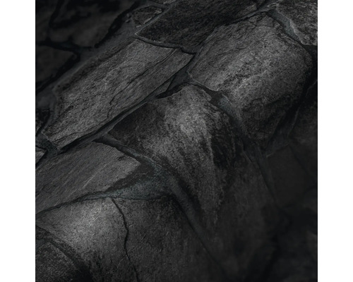 Gros plan d''une structure de mur en pierre sombre