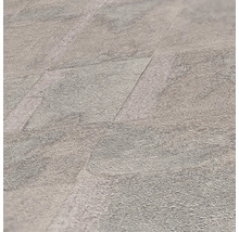 Gros plan de carreaux de sol en vinyle posés avec décor en pierre