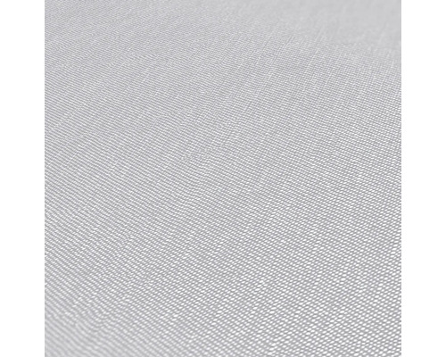 Nahaufnahme eines hellen, feinen Gewebes.