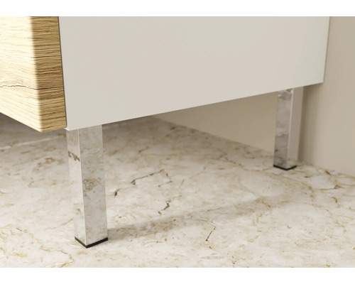 Vue détaillée d''un meuble avec décor bois, surfaces blanches et pieds argentés