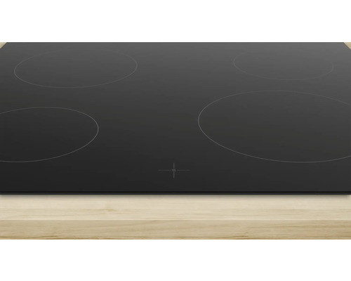 Table de cuisson noire avec quatre zones de cuisson