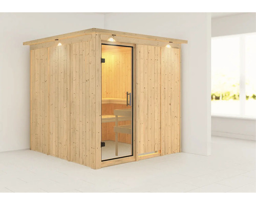 Sauna en bois avec porte en verre et éclairage intérieur dans la pièce