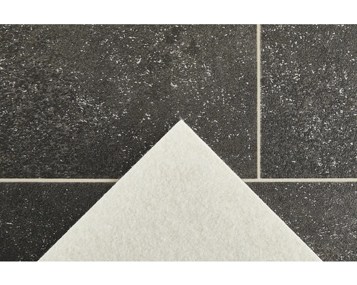 Nahaufnahme eines Vinylbodens mit Steinoptik und weissem Untergrund