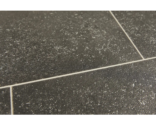 Nahaufnahme von Bodenfliesen mit dunkler Oberfläche