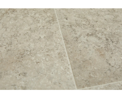 Nahaufnahme von beigefarbenen Bodenfliesen mit gesprenkelter Textur